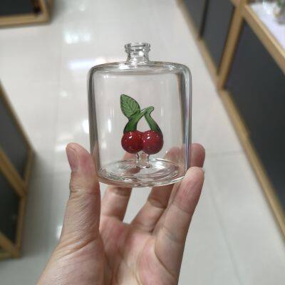 Hand Blown High Borosilicate Glass Perfume Bottle With 3D Internal Sculpture, Custom Fruit/Zodiac Inlay for Luxury Gift