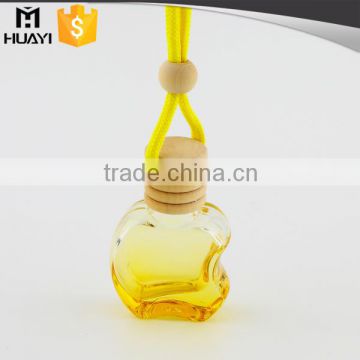 spray color apple shape hanging wooden cap car perfume bottle                        
                                                                                Supplier's Choice