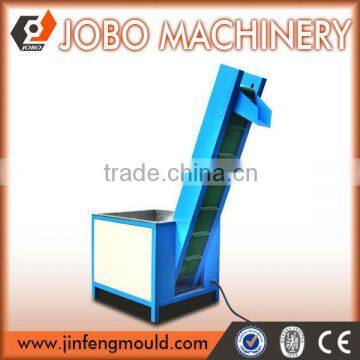 Full-automatic plastic cap slitting machine