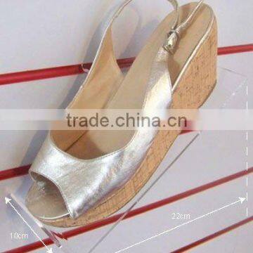 Lucite shoe shelf in suppermarket