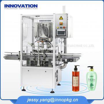 Automatic two head liquid bottling machine for personal care and household chemicals