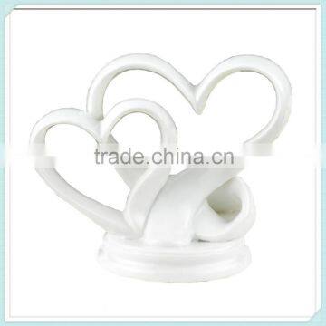 Glazed white ceramic porcelain double heart cake topper                        
                                                Quality Choice