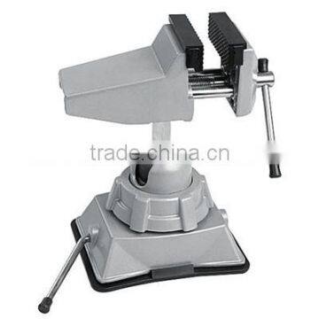 Swivel rotating table vise with suction pad