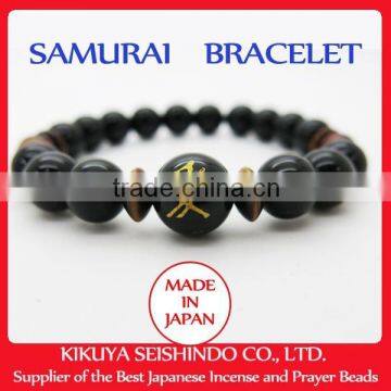 Naoe Kanetsugu samurai bracelet, black onyx 10 mm and Red tiger-eye beads