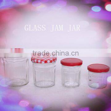 clear glass jam jar with tin lid