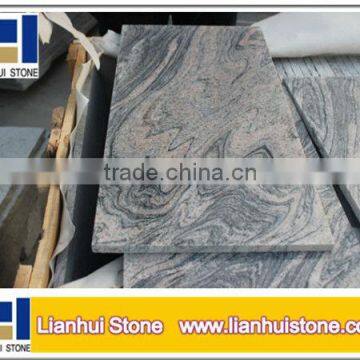 Cheap polished china juparana granite tile with yellow background