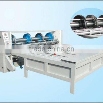 Corrugated paperboard slicing and pressing machine