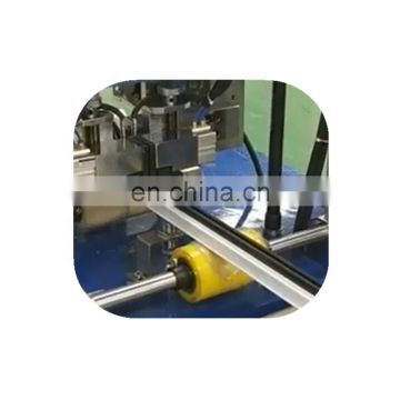 Automatic electric knurling machine and strip feeder