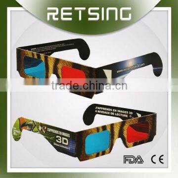 Children Use Anaglyphic 3D Paper Glasses for 3D Book