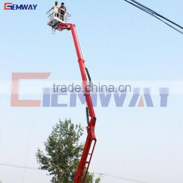 Tow behind trailer articulated boom lift for aerial work platform