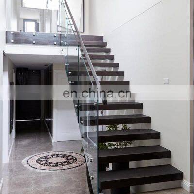 Minimalist 12mm toughened glass balustrade ash tread stairs