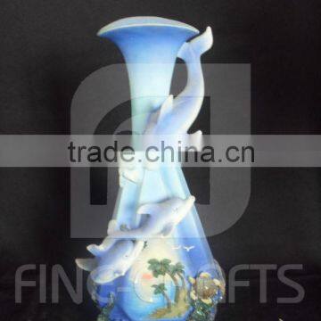 Polyresin flower pot with dolphin figurine