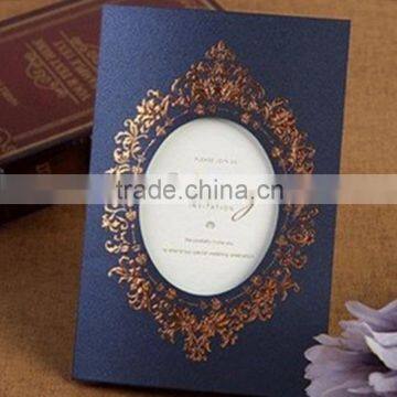 Luxurious royal dark blue laser cut wedding invitations for wedding with golden embossed pattern                        
                                                Quality Choice