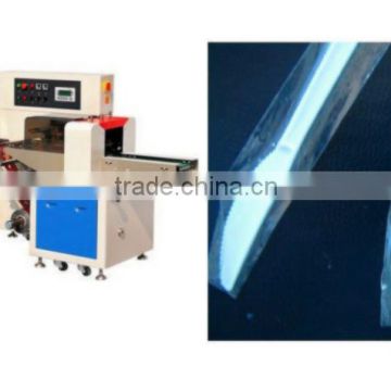 Stainless steel or plastic spoon packing machine