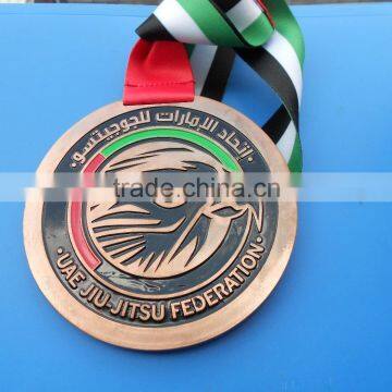 UAE jiu-jitsu federation sport medal with country flag ribbon, custom judo medals