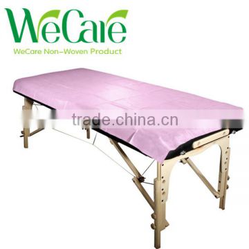 Disposable non woven pink bed sheet for beauty salon