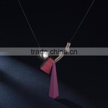 Geometric Wood Bead Pendant Necklace Gold Curved Tube Bead Black Chain Necklace Geomotric Rubber Pendant Long Sweater Necklace photo-4