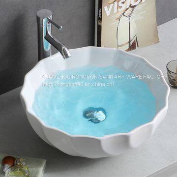 Bathroom white color ceramic new design round durable fancy tabletop wash hand table art basin