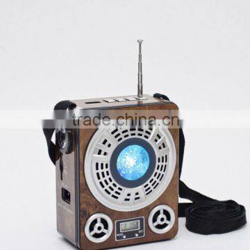 Dongguan New High Quality Clock Disco Light Potable FM New Mini Speaker