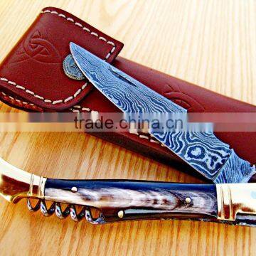 A SCENIC BUFFALO HONEY HORN HANDLE DAMASCUS STEEL LAGUIOLE KNIFE WITH CORK SCREW