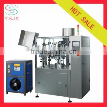 Automatic cream tube filling and sealing machine