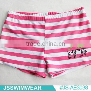 pink and white child swimwear