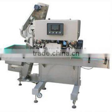 Automatic cap pressing machine