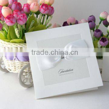 factory price high quality custom white pocket wedding invitation greeting card with ribbon                        
                                                                                Supplier's Choice