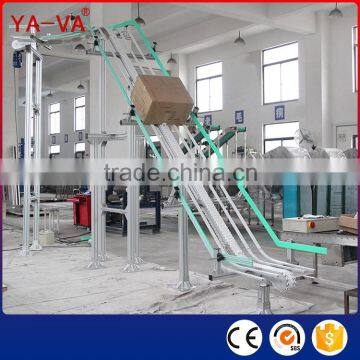 Carton lifting vonveyor system width adjustble