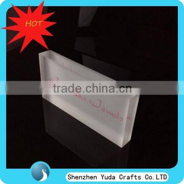 Promotional white acrylic cuboid logo block with monogram, wholesale thick branding block