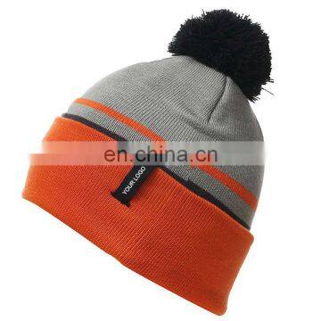 Winter women pom pom custom color knitted ski hat cable rolled brim knitted beanie cap