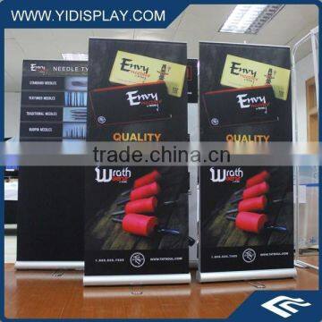 Retractable banner with display