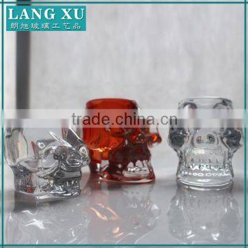 machine made color glass skull candle holder