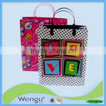 New products for 2016 print flower gift pp bag for packing with pp handle in china suppliers and manufacturer