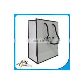 logo printed shopping paper bag packaging with drawstring handling