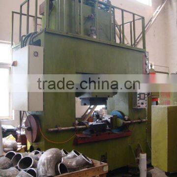 Tee cold forming machine