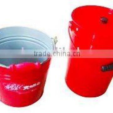 Red tin bucket with iron handle