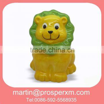 Ceramic coin box of lion shape with money