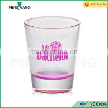 Round empty glass water bottle