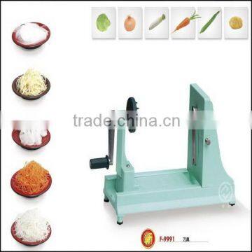 Green plastic cutting tool for cutting food and fruit
