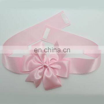 Beauty gift packing bows with adhesive tape at back