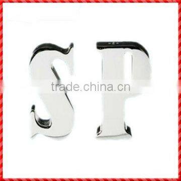 English letter shaped white ceramic colored condiment bottles