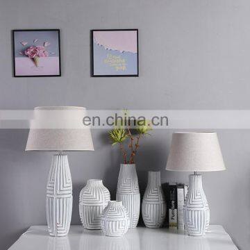 High quality cheap custom bedside lamp hotel home decor retro relief design white resin table lamps