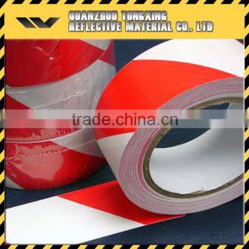 reflective red and white caution tape