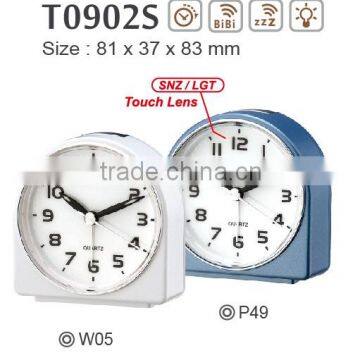 On/Off on top hand size table alarm clock