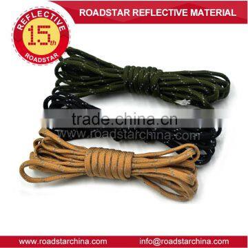 Durable long life reflective string for garment