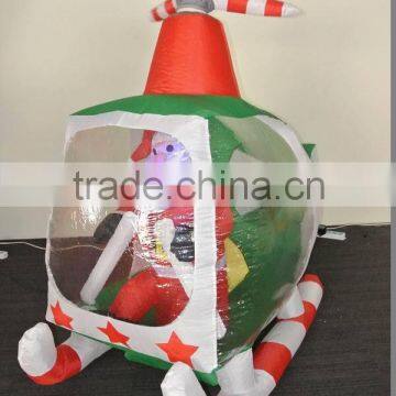 Inflatable santa claus in helicopter