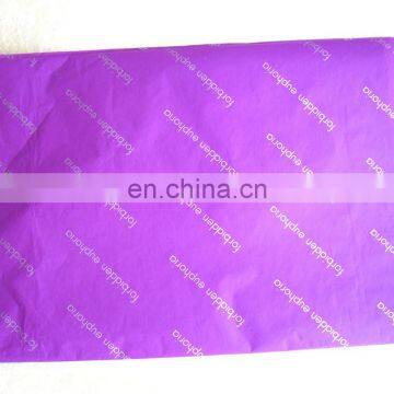 Purple tissue paper with silver printing