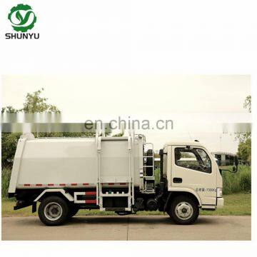 Side Mounted Compressed Garbage Truck Price photo-3