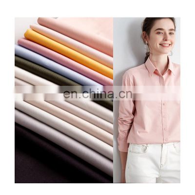 Low MOQ design 72%Cotton 25%Nylon 3%Elastic yarn dyed shirting plain woven fabric for garment